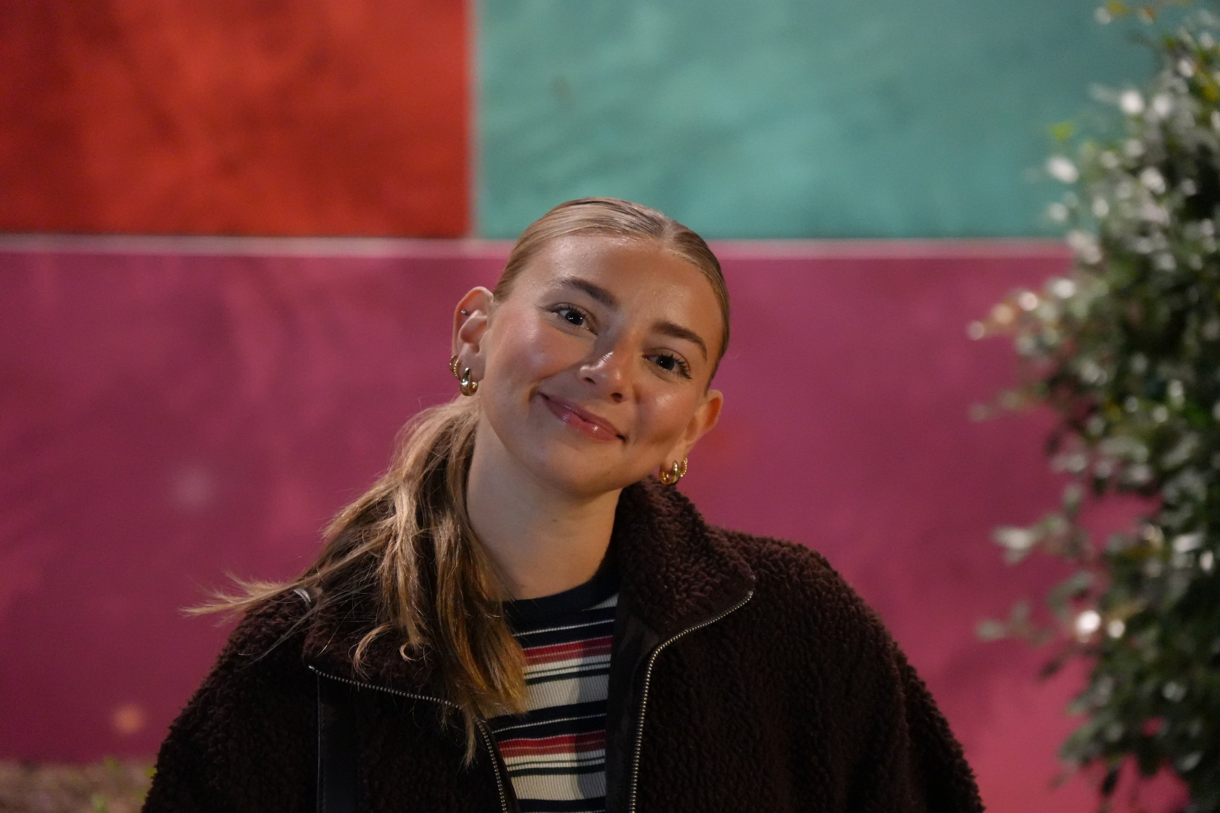Portrait against a colorful wall